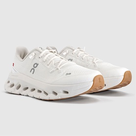 On Running trainers in white ivory, cushioned midsole with segmented pods, tan gum sole, silver logo detail