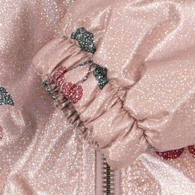 Konges Sl&oslash;jd jacket in Ma Grande Cerise, pink glitter fabric with cherry embroidery detail, elasticated cuff close-up