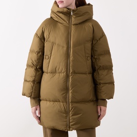 Model wearing Marella Oil Green hooded quilted puffer coat, zip fastening, oversized silhouette, paired with khaki trousers.