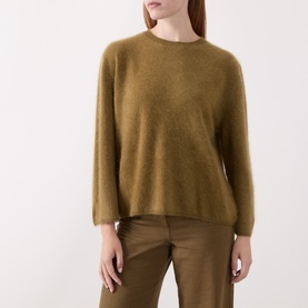 Model wearing Marella oil green wool-cashmere blend crew neck sweater with relaxed fit, styled with brown tailored trousers.