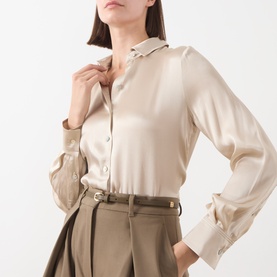 Model wearing Marella turtledove satin shirt with point collar, styled with khaki wide-leg trousers and brown belt.
