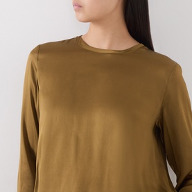 Model wearing Marella oil green long-sleeve silk-blend satin shirt with crew neck and relaxed fit