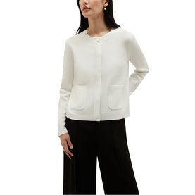 Model wearing Hobbs cream knit cardigan with round neck, long sleeves, and patch pockets, styled with wide-leg black trousers.