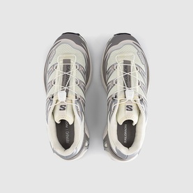 Salomon trainers in Vanilla Ice and Silver Lilac, overhead flat lay showing lace-up front, chunky ridged sole and logo detailing