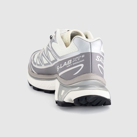 Salomon S-LAB XT-6 trainers in Vanilla Ice Silver Lilac, rear three-quarter view showing grey mesh upper and black rubber outsole.