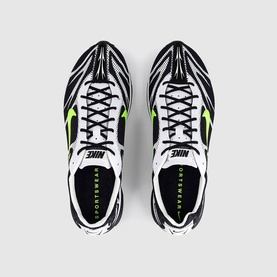 Nike trainers in black, volt and summit white, chunky sole, top-down view showing laces and Sportswear branding