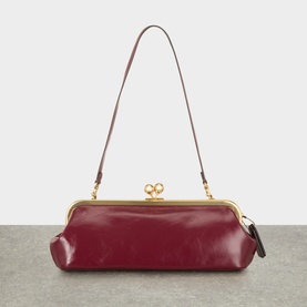 Coach Kisslock 30 Clutch Bag in Dark Cherry textured leather with gold-tone kisslock fastening and detachable shoulder strap