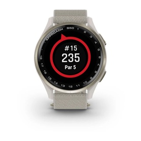 Garmin Approach S50 Smart Watch in cream, round face displaying golf hole data, light sand-coloured fabric strap, gold-tone case