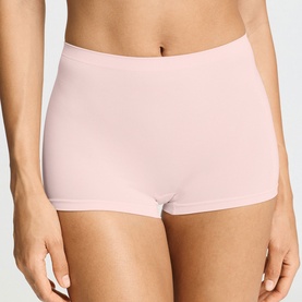 Model wearing Hanro Rosewater shorts briefs in smooth seamless fabric with a mid-rise boyshort silhouette