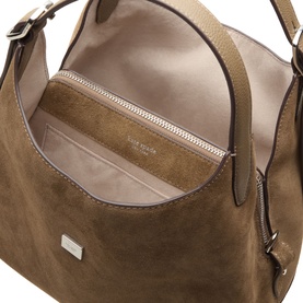 Kate Spade driftwood leather crossbody bag, open view showing interior zip pocket and pale blush lining, silver-tone hardware