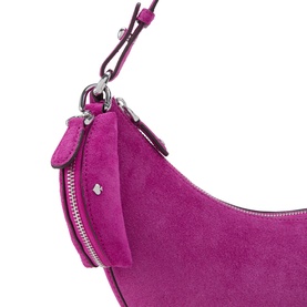 Kate Spade fuchsia suede crossbody bag, close-up of side zip detail and silver hardware with adjustable strap visible