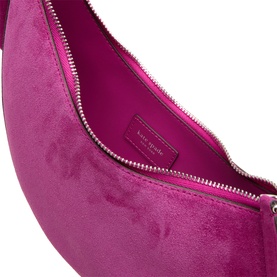 Kate Spade fuchsia leather crossbody bag, open view showing silver zip detail and bright pink interior lining