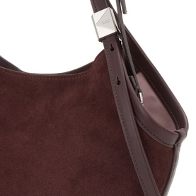 Kate Spade Blackberry Jam suede and leather tote with silver pyramid stud hardware and adjustable shoulder strap, close-up detail
