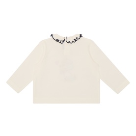 Mayoral baby dress in natural, cream linen with contrasting dark navy scalloped ruffle collar, long sleeves, flat lay view.