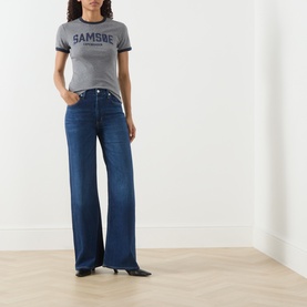 Model wearing Samsoe & Samsoe mid grey mel cotton T-shirt with navy logo print and contrast trim, styled with wide-leg dark blue jeans.