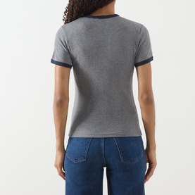 Model wearing Samsoe & Samsoe mid grey marl cotton T-shirt with navy contrast trim, shown from the back, styled with blue jeans.