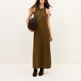 Model wearing Bash brown ribbed sleeveless maxi dress, styled with dark brown ankle boots and small dark bag