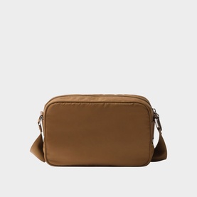 Tan nylon crossbody bag with silver-tone zip fastening and matching adjustable shoulder strap, rear view
