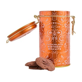Cartwright & Butler Chocolate Birthday Biscuits in copper-toned decorative tin with gold clip fastening, biscuits displayed in front.