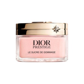 Dior Prestige Le Sucre de Gommage body scrub in a pink glass jar with gold star-embossed lid