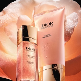 Dior Prestige La Micro Huile de Rose and Le Baume D&eacute;maquillant cleanser duo displayed against a soft pink rose backdrop