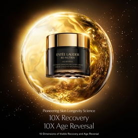 Est&eacute;e Lauder Re-Nutriv Age Reversal Recovery Cr&egrave;me in black and gold jar, suspended within a luminous golden sphere.