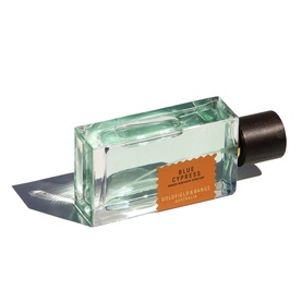 Goldfield & Banks Blue Cypress EDP in clear rectangular bottle with dark cap and tan label, shot with angular shadow detail