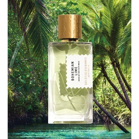 Goldfield & Banks Bohemian Lime Eau de Parfum, clear glass bottle with gold cap, styled against tropical palm tree backdrop