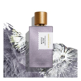 Goldfield & Banks Mystic Mists EDP in a frosted lilac glass bottle with gold cap, styled with crystal botanicals
