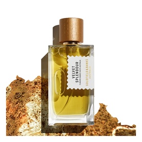 Goldfield & Banks Velvet Splendour EDP in glass bottle with wooden cap, golden amber liquid, displayed with textured golden bark fragment.