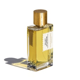 Goldfield & Banks EDP in clear glass bottle with gold cap, containing golden amber fragrance liquid