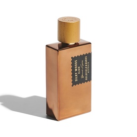 Goldfield & Banks Silky Woods Parfum in a copper-toned rectangular bottle with gold cap and dark label