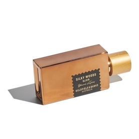 Goldfield & Banks Silky Woods Elixir parfum in rose gold-toned rectangular bottle with gold cylindrical cap