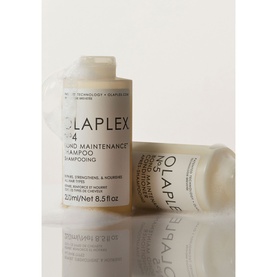 Olaplex The Healthy Hair Discovery Set featuring No.4 Bond Maintenance Shampoo bottles in white packaging, shown upright and angled