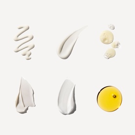 Olaplex The Healthy Hair Discovery Set texture swatches showing six product formulas including creams, serums, and a golden oil drop.