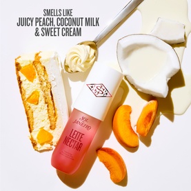 Sol De Janeiro Leite Nectar Perfume Mist body mist bottle styled with peach slices, coconut, and sweet cream ingredients