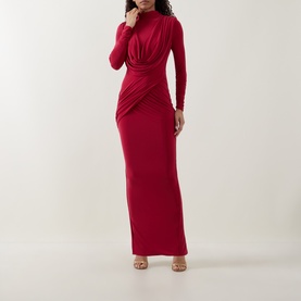 Model wearing Club London Red long sleeve maxi dress with high neck, ruched waist detail, styled with nude heeled sandals