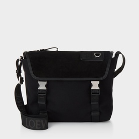 Loewe black canvas and suede messenger bag with buckle front straps, gunmetal hardware, and branded woven crossbody strap