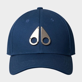 Moose Knuckles navy baseball cap with silver logo badge on crown, structured fit with curved brim