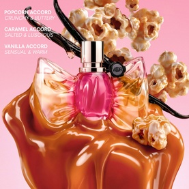 Viktor & Rolf Flowerbomb Nectar EDP in pink bottle, styled with caramel, popcorn, and vanilla accord visual campaign