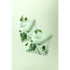 Anua Firm/Tone treatment sheet masks in white and green botanical packaging, shown as two overlapping packets