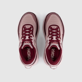 Hoka running trainers in dusty pink and burgundy, cushioned midsole, lace-up front, overhead flat-lay view