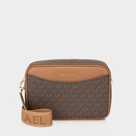 MMK brown and acorn coated canvas crossbody bag with logo print, acorn leather trim, gold-tone hardware, and branded logo strap