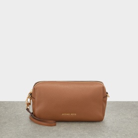 MMK Luggage leather crossbody bag with gold-tone zip hardware and wrist strap, structured rectangular silhouette