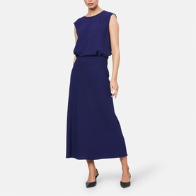 Model wearing Helen McAlinden Ink Blue sleeveless maxi dress with elasticated waist, styled with dark pointed-toe flats