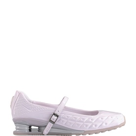 Nike mary jane flat shoe in pearl pink with quilted upper, ankle strap buckle detail, and silver Shox sole unit