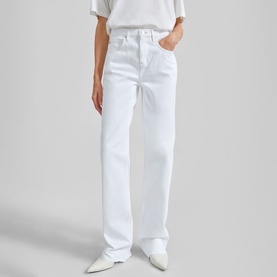 Model wearing The Frankie Shop Dalston Straight Leg Jeans in white, high-rise relaxed fit with straight leg, styled with a white T-shirt.