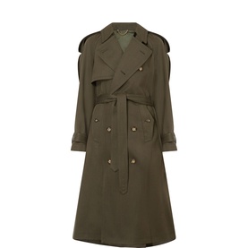Victoria Beckham double-breasted trench coat in Golden Ember wool, featuring notched lapels, epaulettes, and self-tie belt