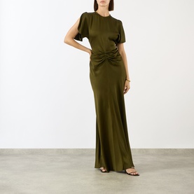Model wearing Victoria Beckham Dark Green satin gown with ruched waist detail, short sleeves, and floor-length skirt, styled with black strappy