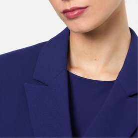 Helen McAlinden ink blue blazer close-up, notch lapel detail, worn over matching ink blue top